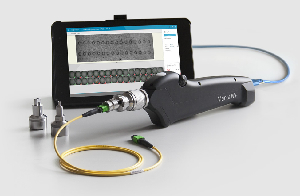 Microscopio con conector óptico de haz ampliado